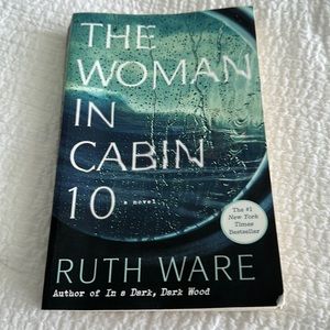 Ruth Ware book- The women in CABIN 10, also author of in the dark, dark wood.